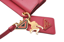 画像をギャラリービューアに読み込む, 同様に PRADA プラダ カードケース バッグチャーム 1TL344 トライアングルロゴ サフィアーノレザー ピンク ゴールド金具 中古 65866 