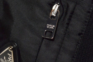 極美品 PRADA プラダ カーゴパンツ 三角プレート ニットパンツ E136 サイズ48 シルバー金具 ブラック 中古 4c067121 