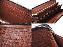Load image into Gallery viewer, LOUIS VUITTON ルイヴィトン ジッピー ウォレット 長財布 財布 M60017 モノグラム ブラウン系 ゴールド金具 美品 中古 67215