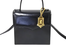 画像をギャラリービューアに読み込む, YVES SAINT LAURENT イヴ サンローラン ハンドバッグ 台形 YSL チャーム付き レザー ゴールド金具 ブラック 美品 中古ロゴ 67291 