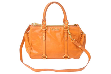 MIUMIU ミュウミュウ ハンドバッグ 2WAY ショルダーバッグ ダブルジッパー オレンジ レザー RN0894 ゴールド金具 美品 中古 4c076219