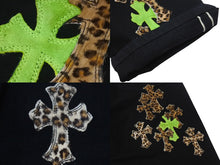 Load image into Gallery viewer, Excellent condition CHROME HEARTS JEAN STRTLG FBRC denim cross patch straight leg denim pants in black leopard print, size 34, pre-owned, item number 4c076690 
