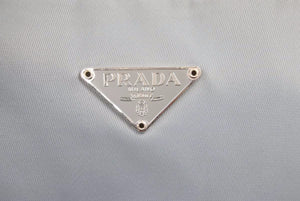 PRADA プラダ ナイロンポーチ ミニ ハンドバッグ 三角ロゴプレート コットン ライトブルー 水色 レディース 美品 中古 42146