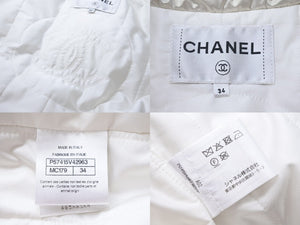 CHANEL シャネル ダウンジャケット アウター リボン付き P57415V42963 ロゴ ポリエステル ホワイト サイズ34 美品 中古 48166 正規品