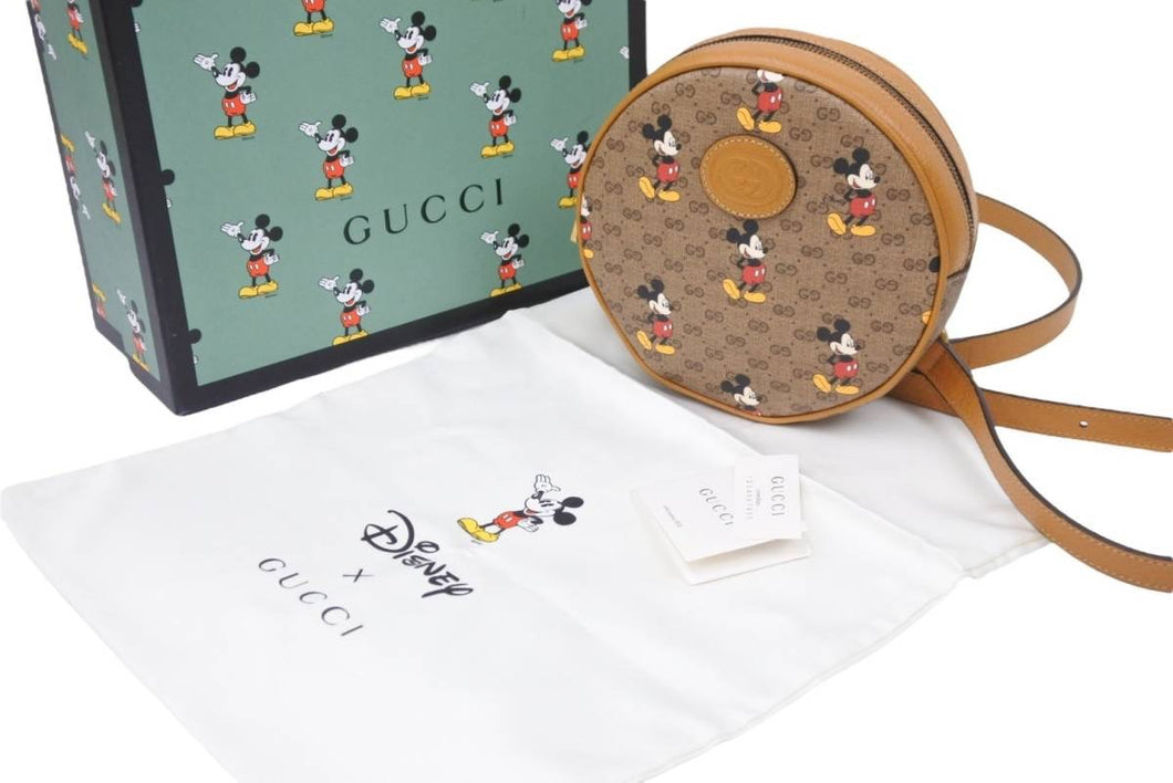 極美品 GUCCI × Disney グッチ ディズニー コラボ ミッキー ミニ リュック バックパック 柄 GGスプリーム 603730 HWUBM 中古 50601
