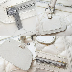 CHANEL シャネル ボストンバッグ パリ ニューヨーク 10番台 ココマーク ラムスキン アイボリー シルバー金具 中古 51498