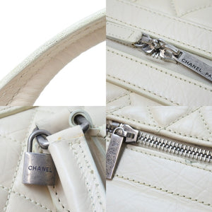 CHANEL シャネル ボストンバッグ パリ ニューヨーク 10番台 ココマーク ラムスキン アイボリー シルバー金具 中古 51498