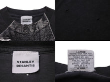 Load image into Gallery viewer, STANLEY DESANTIS スタンリーデサンティス オズの魔法使い 半袖Ｔシャツ カカシ ロゴTシャツ ブラック 美品 中古 54041