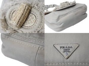 PRADA プラダ ショルダーバッグ ポシェット フリンジ チェーン デニムキャンバス BR4680 ベージュ シルバー金具 美品 中古 56517