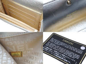 CHANEL シャネル 二つ折り財布 スパークリングデニム ココマーク 10番台 2006年 キャンバス インディゴ ゴールド 美品 中古 57166