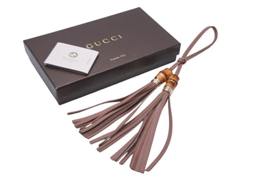 新品同様 GUCCI グッチ バンブー タッセルチャーム フリンジ キーホルダー バッグチャーム レザー ピンクベージュ 中古 57396