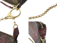 Load image into Gallery viewer, LOUIS VUITTON ルイヴィトン ポーチ M63798 ミニポシェッモノグラム トラベルコレクション ゴールド金具 美品 中古 57399