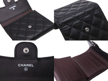 Load image into Gallery viewer, CHANEL シャネル 三つ折り財布 財布 マトラッセ ラムスキン 28番台 ココマーク シルバー金具 美品 中古 58953