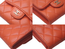Load image into Gallery viewer, CHANEL シャネル 三つ折り財布 スモールウォレット マトラッセ ラムスキン 29番台 オレンジ ゴールド金具 美品 中古 61285